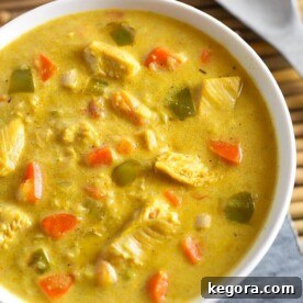 A beautiful bowl of Instant Pot Mulligatawny Soup, garnished and ready to be enjoyed, highlighting its rich, creamy texture.