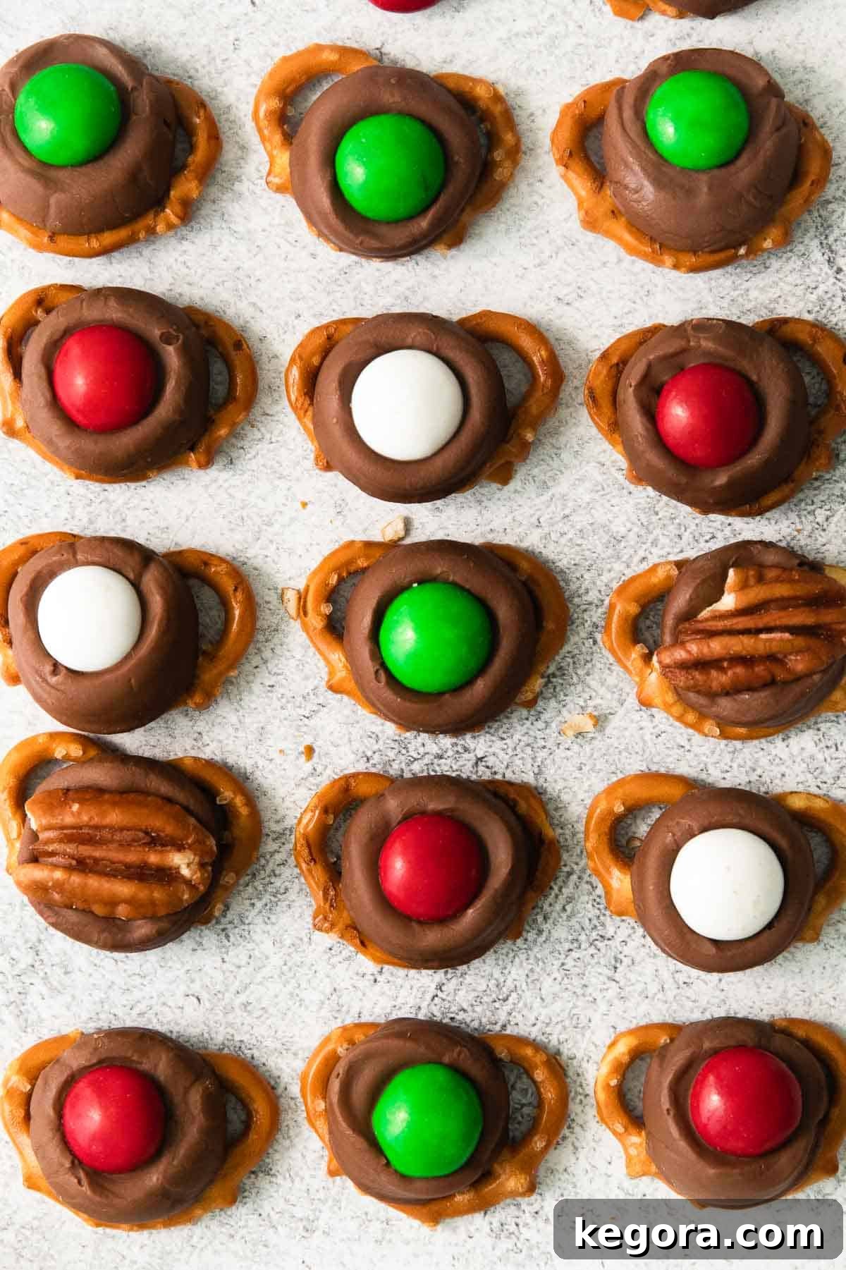 Rows of finished Rolo pretzel bites cooling on a countertop, ready for packaging or serving.