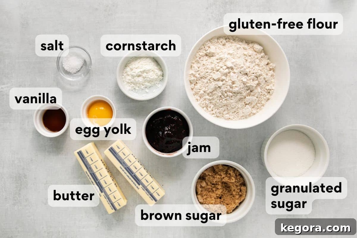 Gluten-Free Thumbprint Delights 4 Various thumbprint cookie ingredients, including flour, sugar, butter, and jam, neatly measured and labeled on a counter.