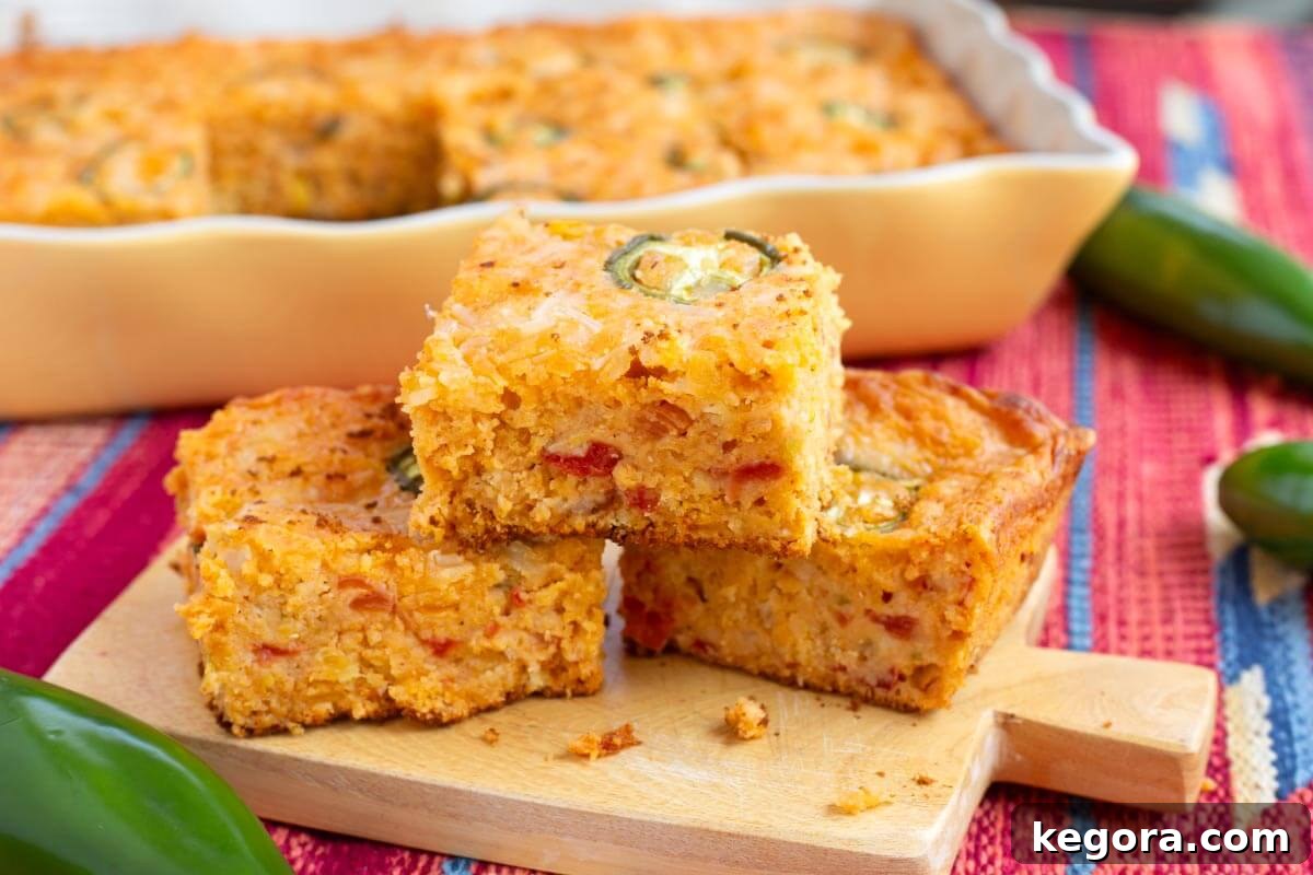 Loaded Tex-Mex Cornbread 10 3 pieces of Tex-Mex Cornbread on a board