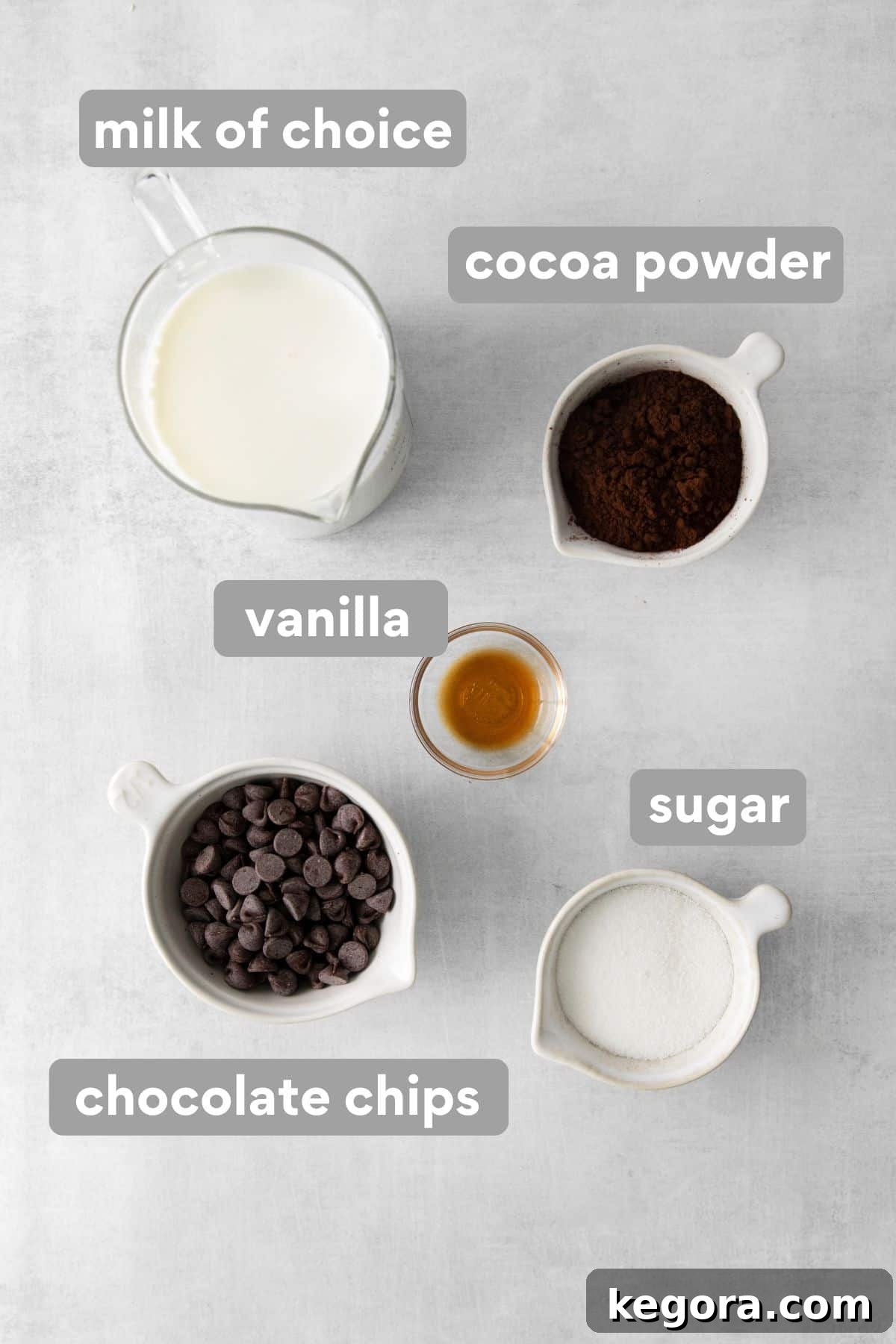 Ingredients for gluten-free hot chocolate on a countertop, laid out for easy viewing