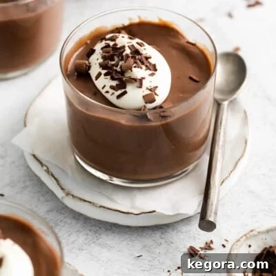A side view of chocolate pudding in a ramekin