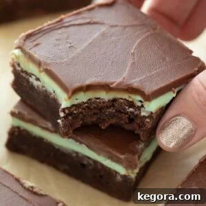 gluten free mint brownies with bite taken out being held