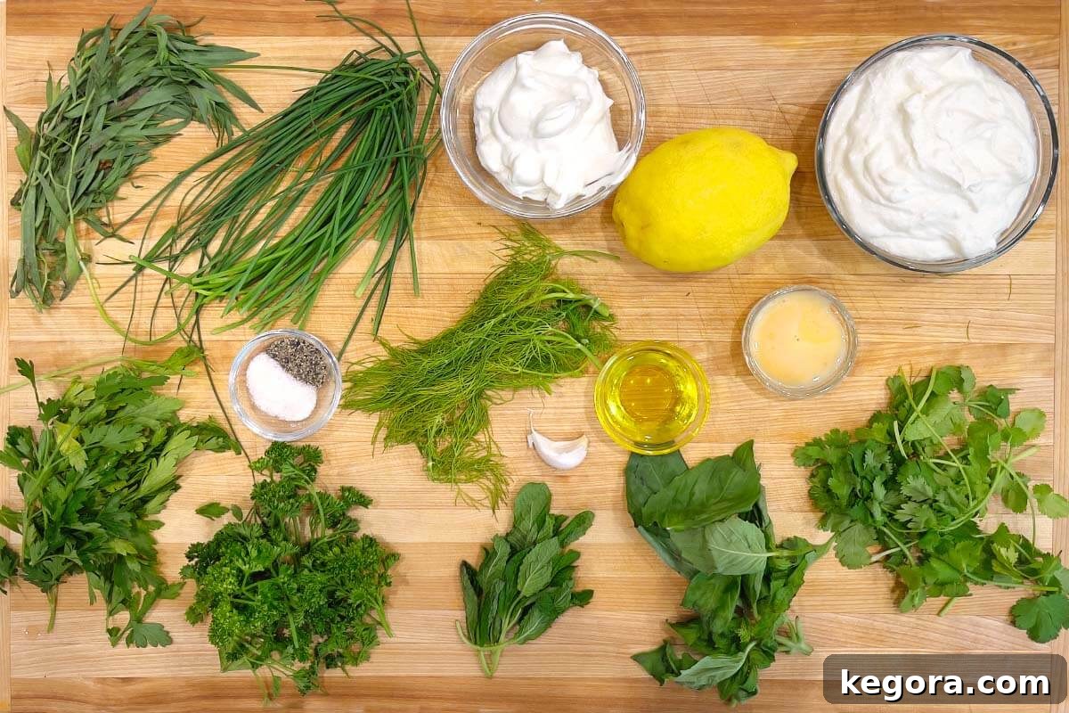 Creamy Herb Yogurt Dressing ingredients shot on board