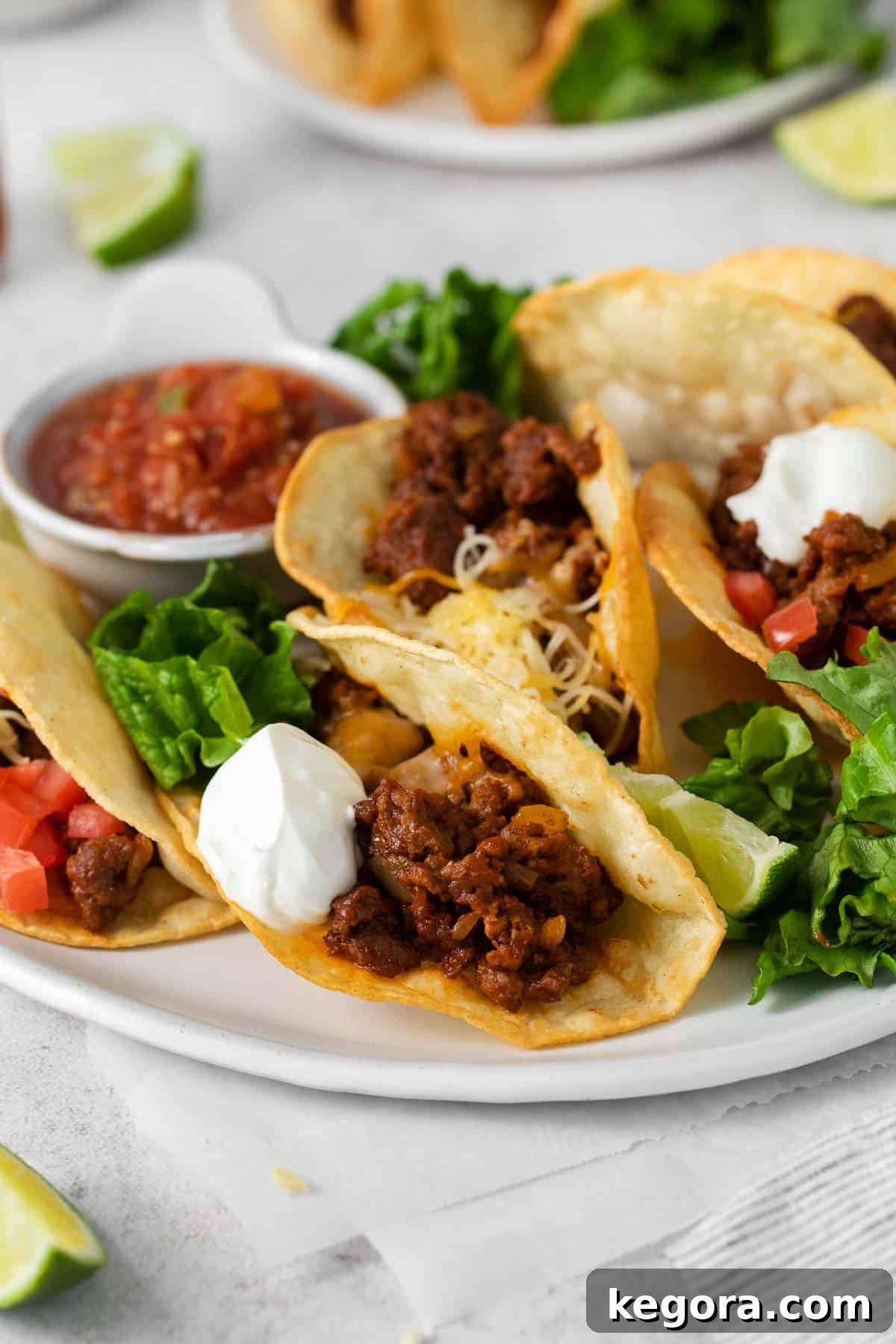 Effortless Gluten-Free Taco Night 8 Gluten-free tacos served with a side of fresh salsa, ready to be enjoyed.