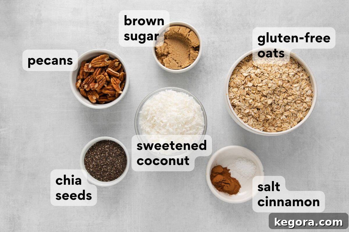 All the dry and wet ingredients for making gluten-free granola, neatly measured and labeled in individual bowls.