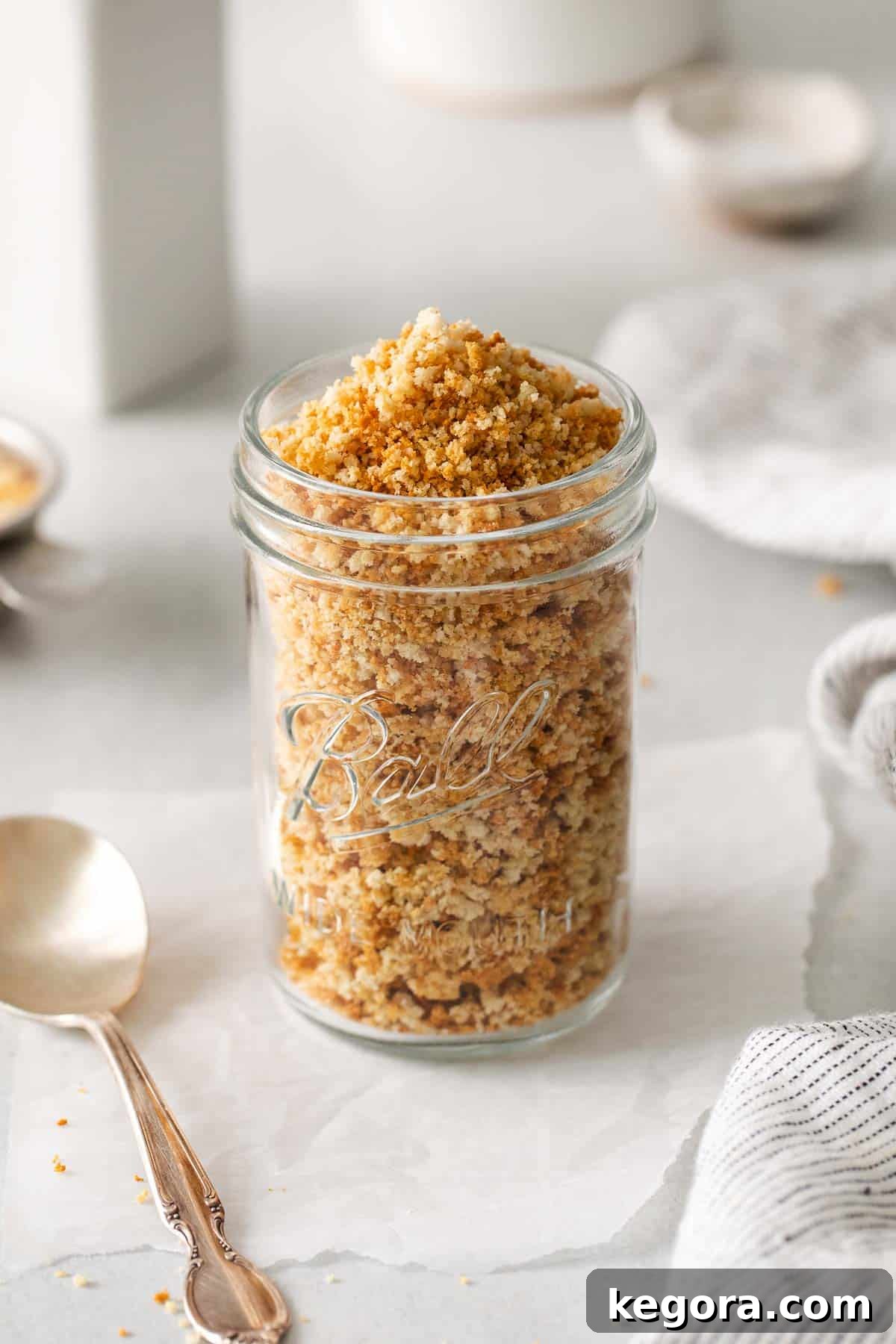 Gluten-free breadcrumbs stored in a Mason jar, illustrating proper storage.