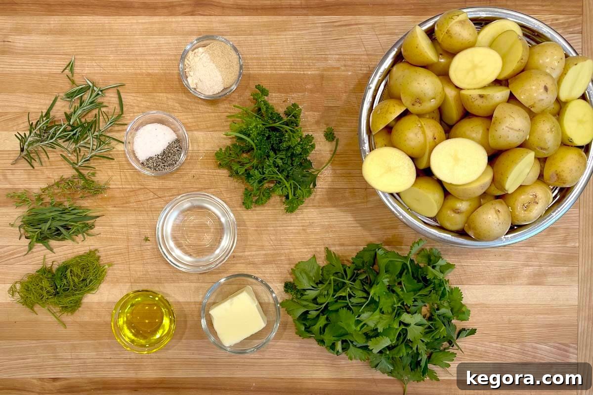 Savory Garlic Herb Slow Cooker Potatoes 4 Fresh ingredients for Slow Cooker Garlic Herb Potatoes laid out on a wooden board