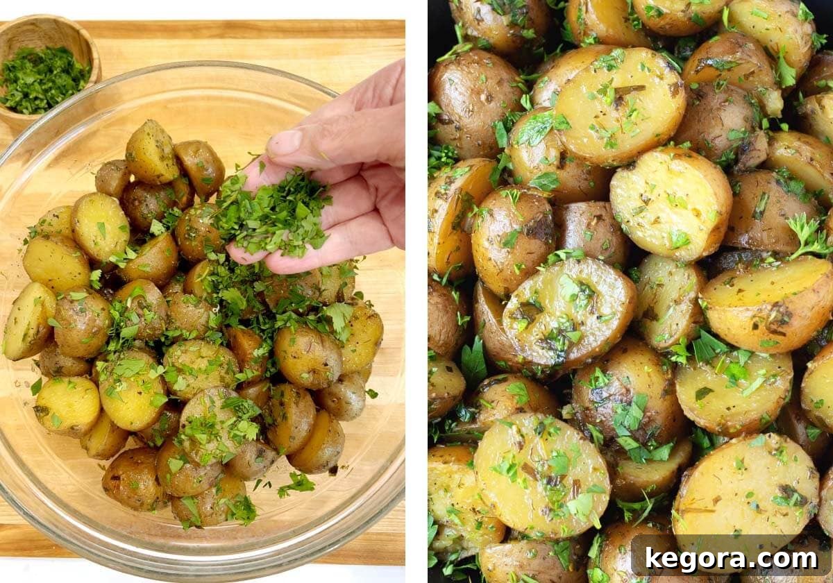 Savory Garlic Herb Slow Cooker Potatoes 8 Fork-tender Slow Cooker Garlic Herb Potatoes in the crockpot, ready to be served and garnished