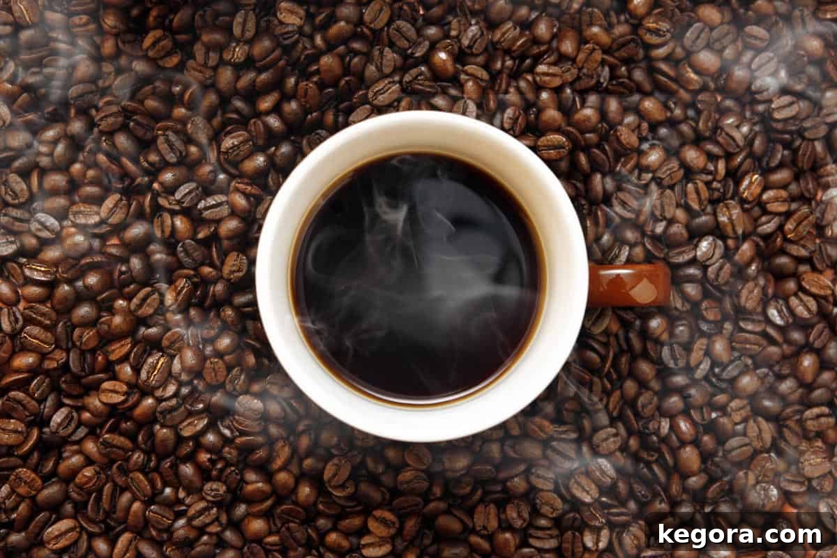 The Truth About Coffee and Gluten 3 A close-up of a coffee cup surrounded by roasted coffee beans, emphasizing the natural source of the beverage.