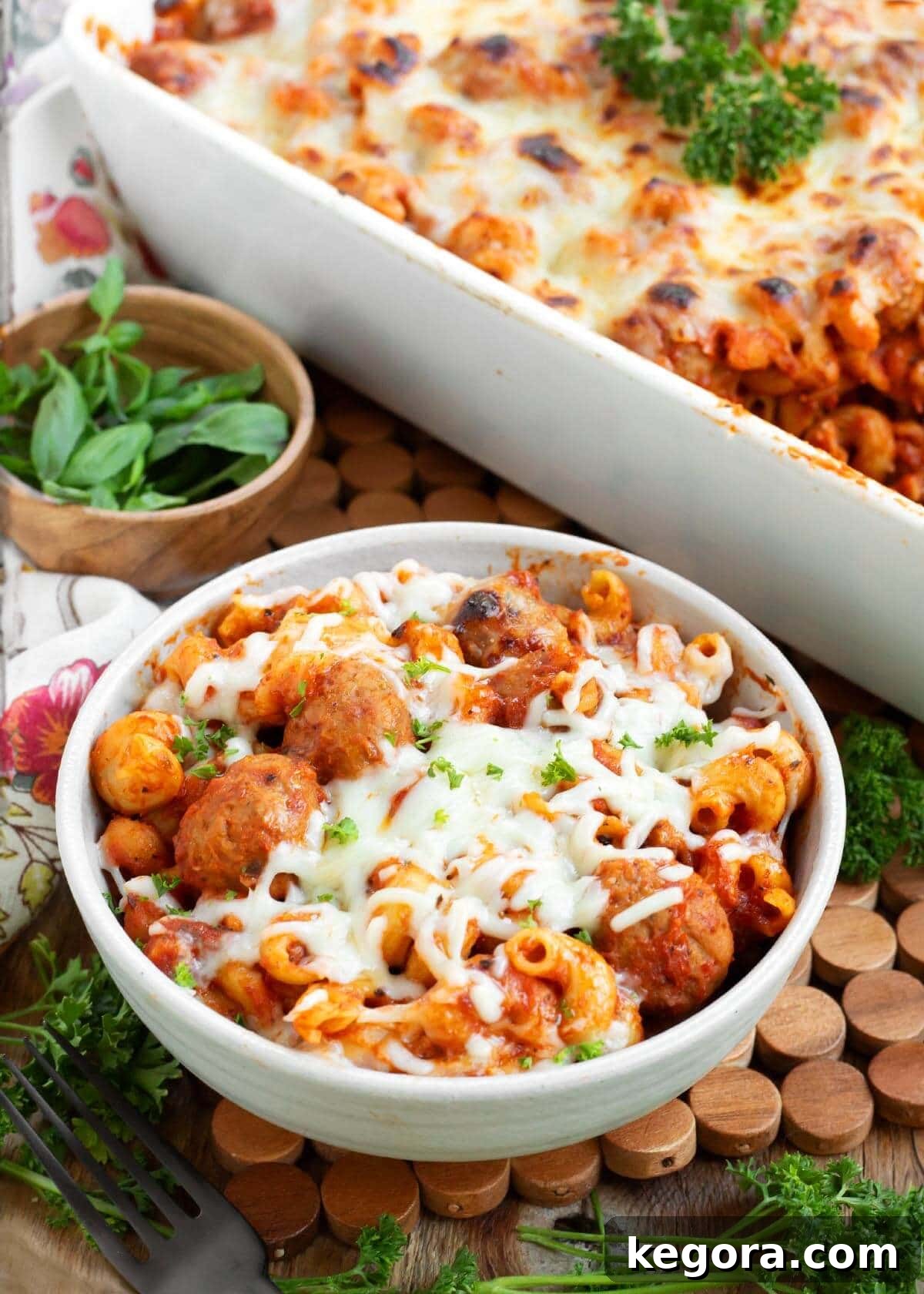 Easy Meatball Pasta Bake in white bowl