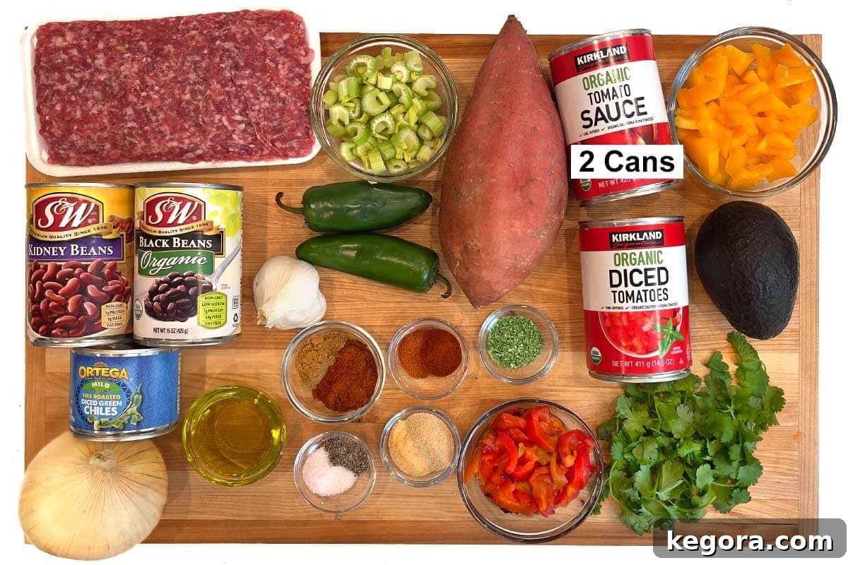Sausage Sweet Potato Chili ingredients shot on board