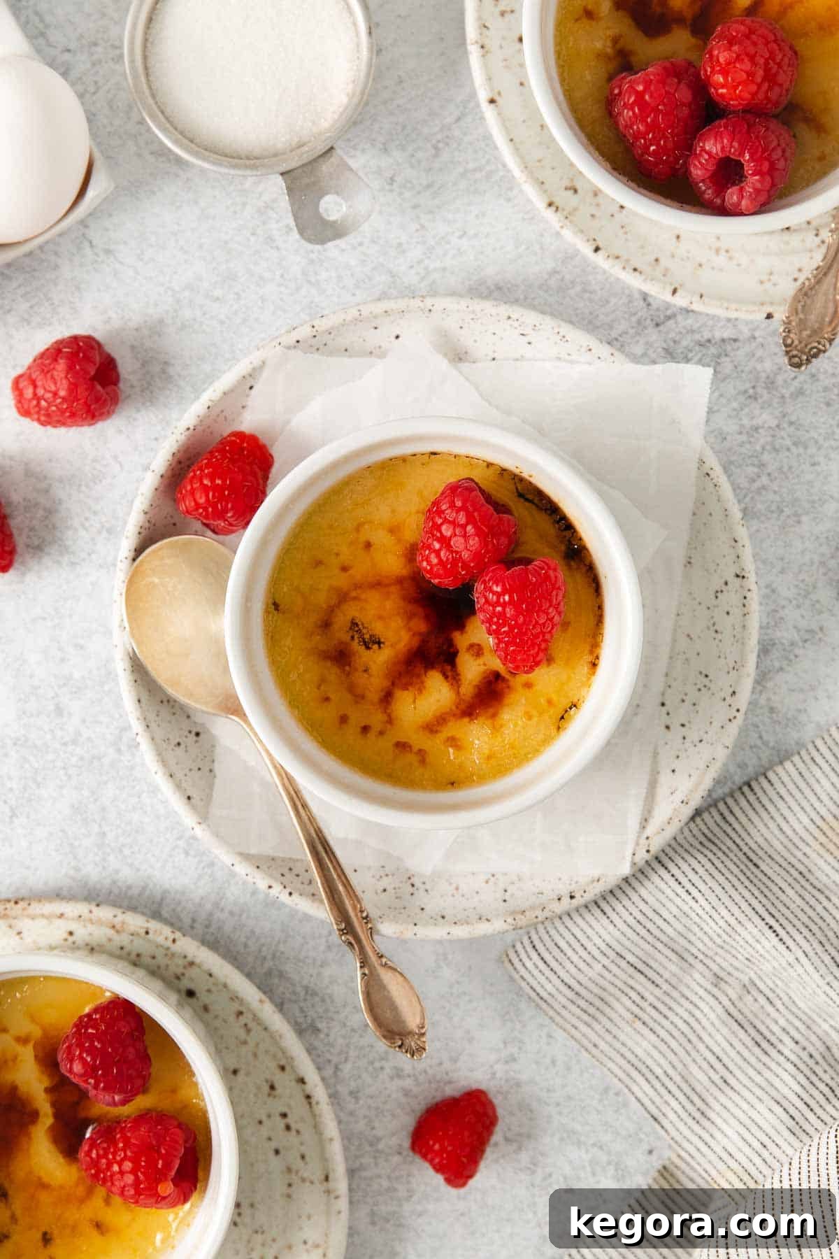 Dairy-Free Dream Brûlée 10 An inviting overhead view of a perfectly caramelized dairy-free creme brulee in a ramekin, showcasing its glossy, crackled sugar topping, ready to be enjoyed.