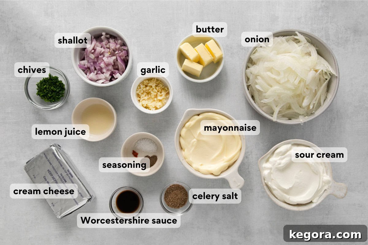 Ultimate Caramelized Onion Dip 4 An assortment of fresh, high-quality ingredients, including creamy sour cream, rich mayonnaise, softened cream cheese, various onions, and aromatic spices, neatly arranged on a clean countertop, ready for preparing the caramelized onion dip.