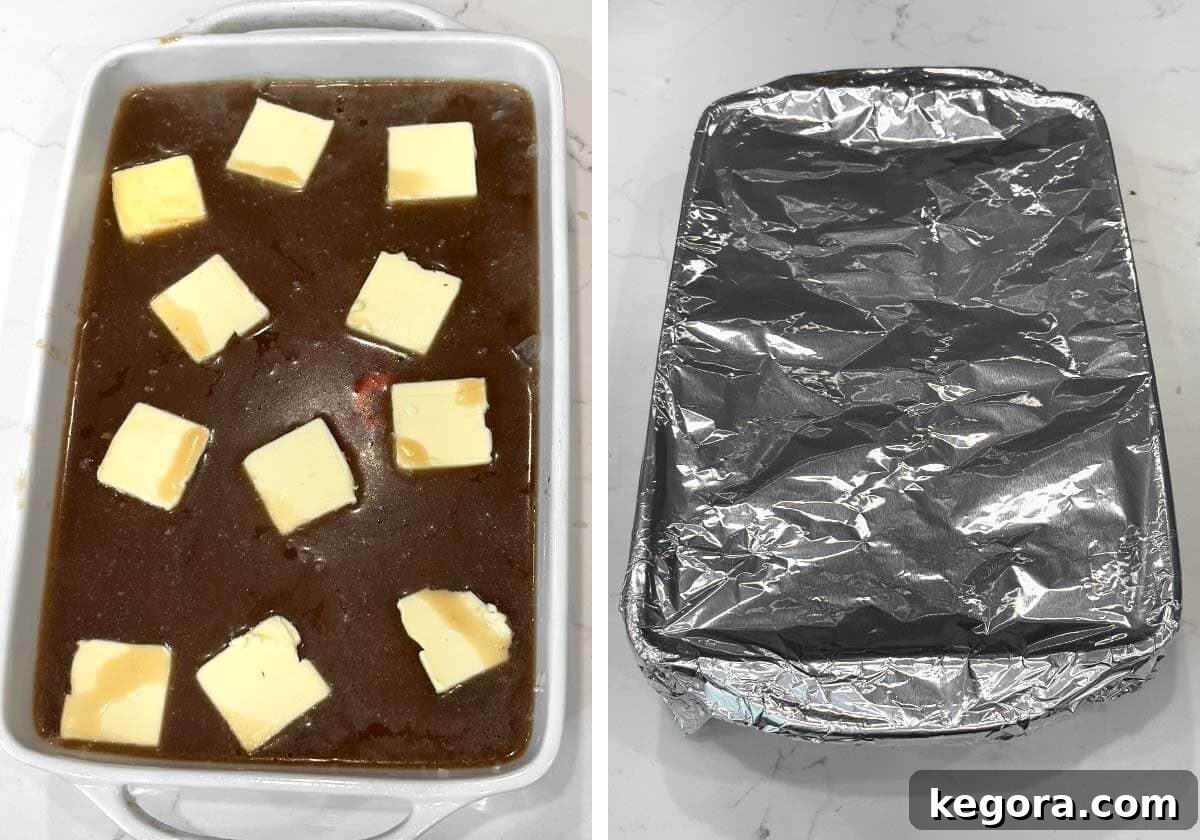 Slices of unsalted butter are placed over the casserole, which is then tightly wrapped in aluminum foil for baking.