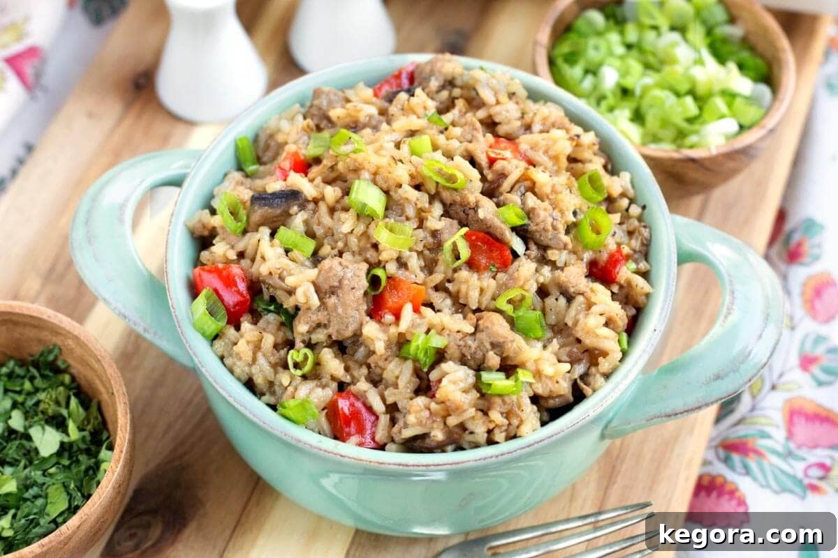 Hamburger Rice Casserole served in a green bowl, ready for a comforting meal.
