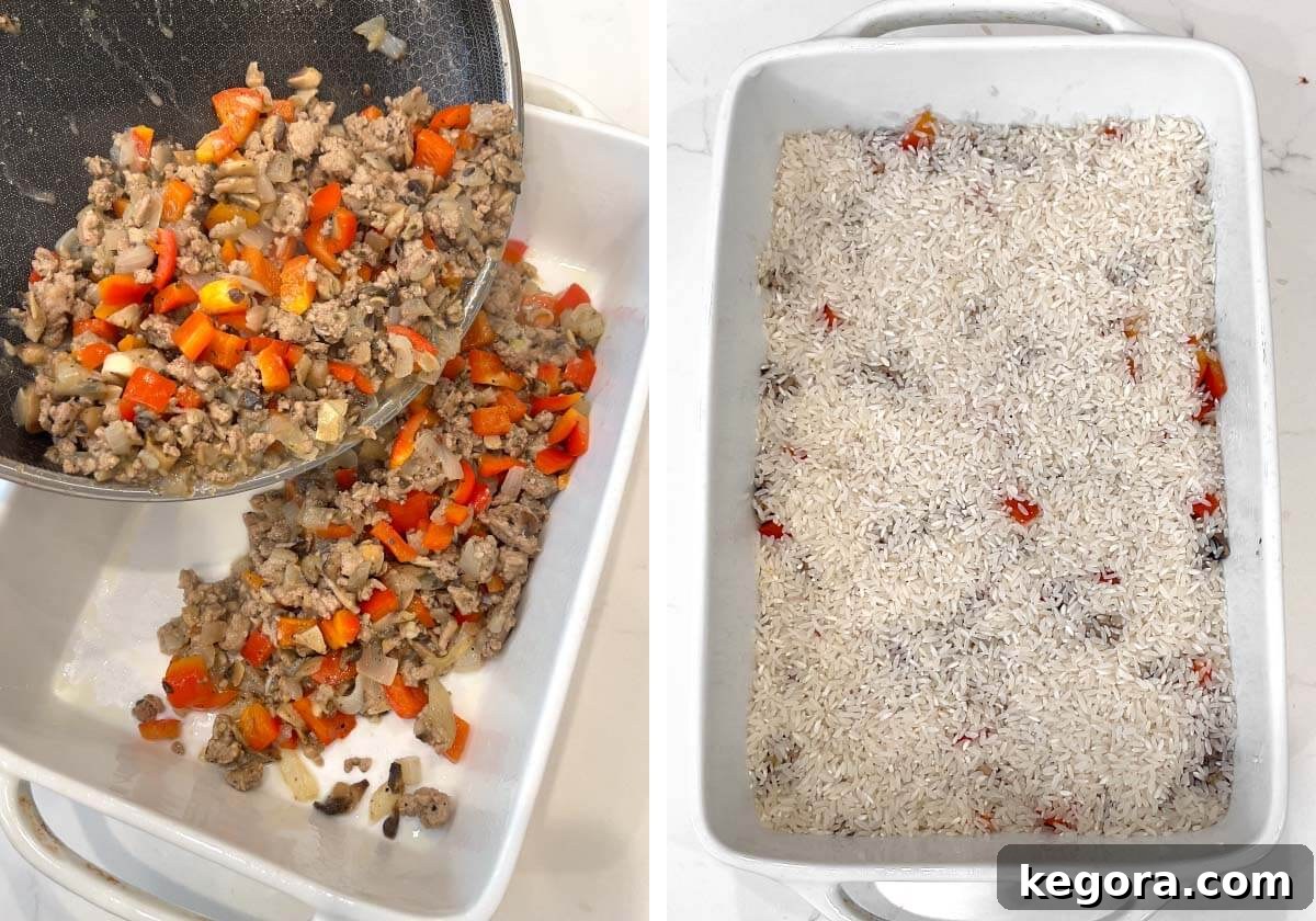 The seasoned meat mixture is transferred to the baking dish, and uncooked rice is spread evenly over the top.