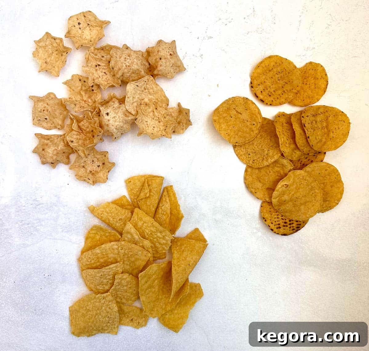 Unpacking Gluten in Tortilla Chips 3 3 different shapes of tortilla chips on white background
