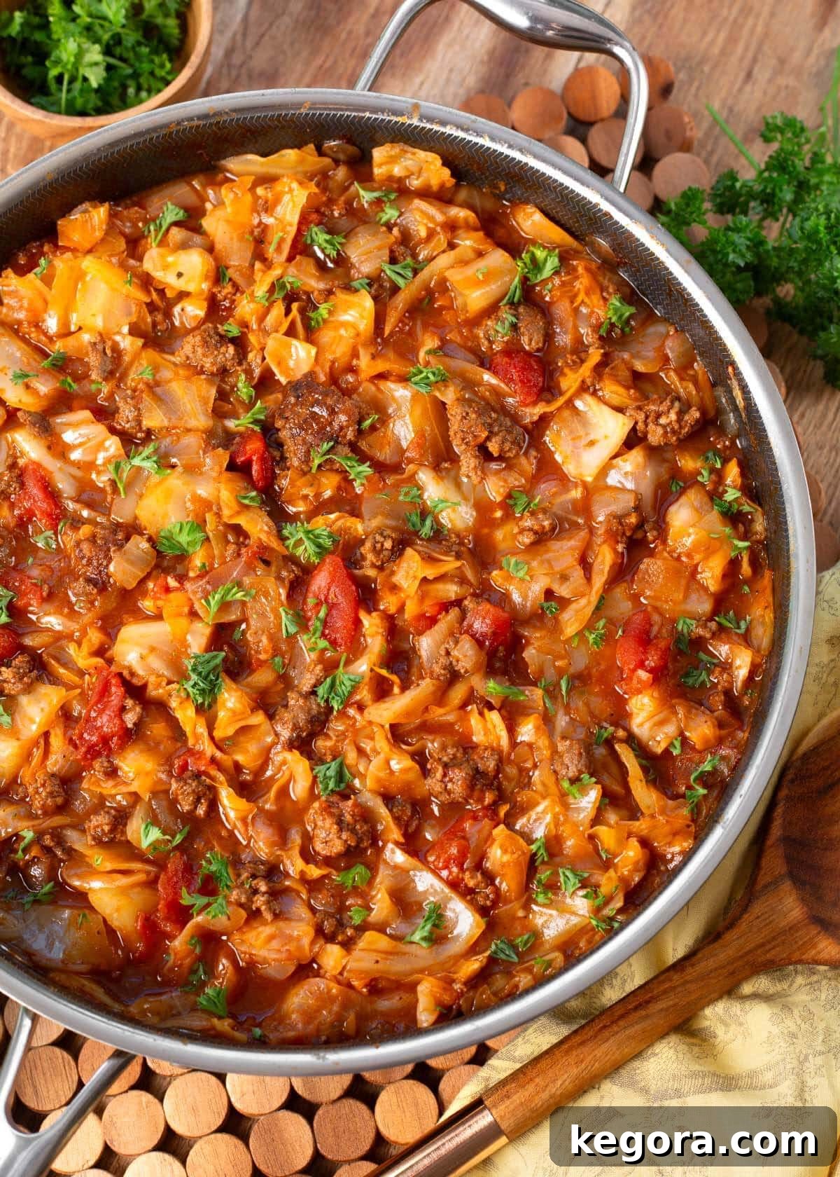 Savory One-Pan Beef and Cabbage Dinner 10 A beautifully plated Ground Beef Cabbage Skillet, garnished and ready for a comforting family meal.