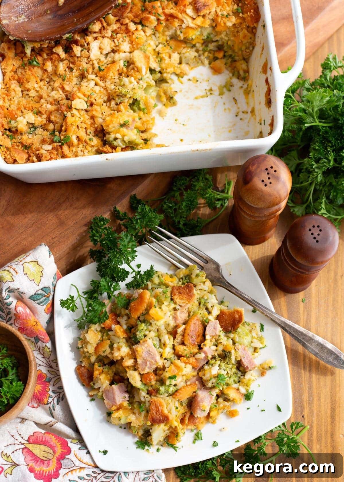 Hearty Ham and Broccoli Rice Bake 10 A large, inviting Ham and Broccoli Rice Casserole in a rectangular baking dish, ready to be served, showing a rich, golden topping and creamy interior.