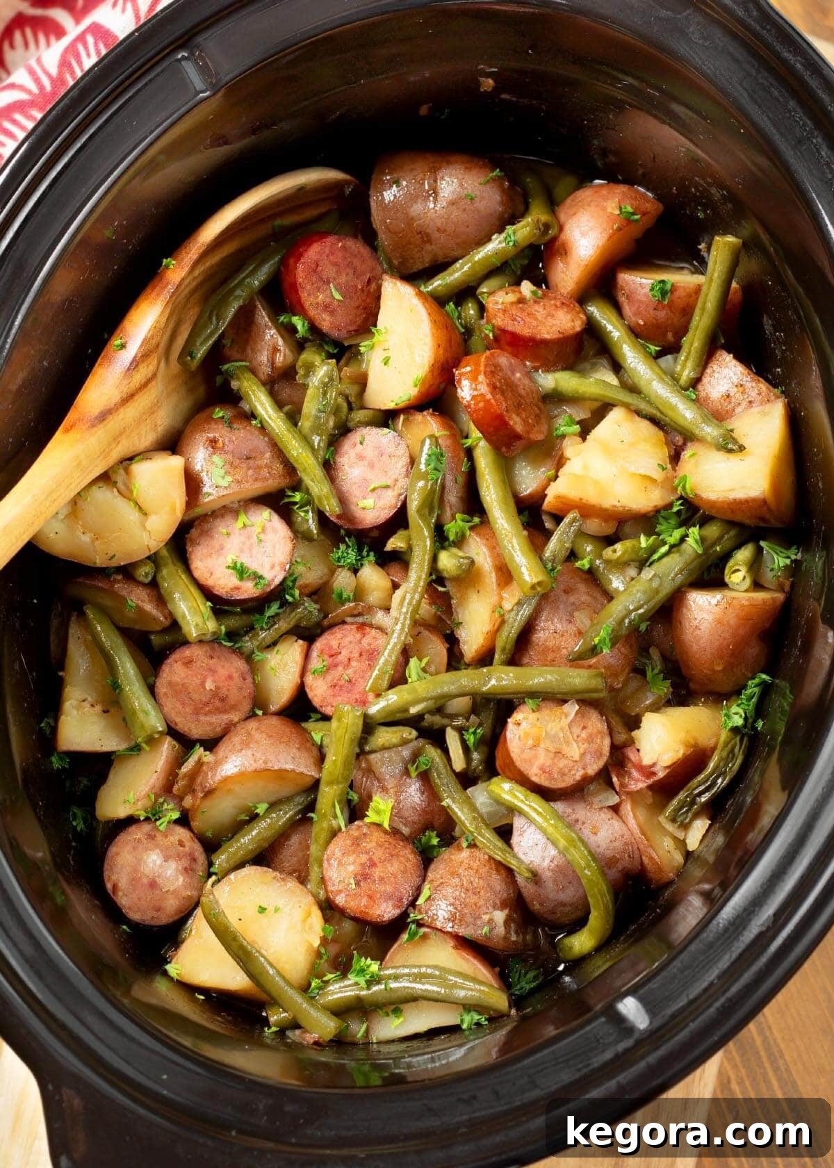 Classic Crockpot Swamp Potatoes recipe, a savory slow cooker dish with tender potatoes, smoked sausage, and fresh green beans.