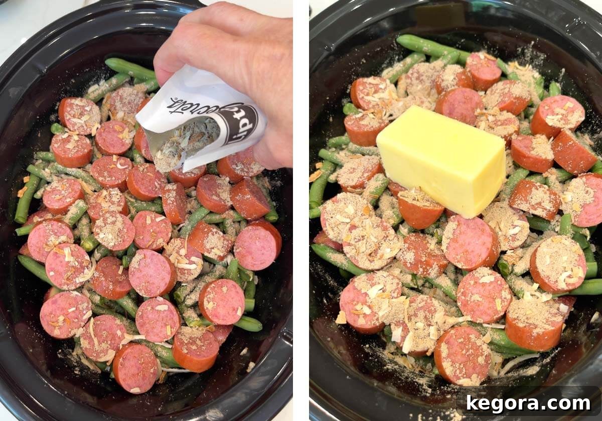 Onion soup mix sprinkled over smoked sausage and a whole stick of butter placed on top in the slow cooker for Crockpot Swamp Potatoes.