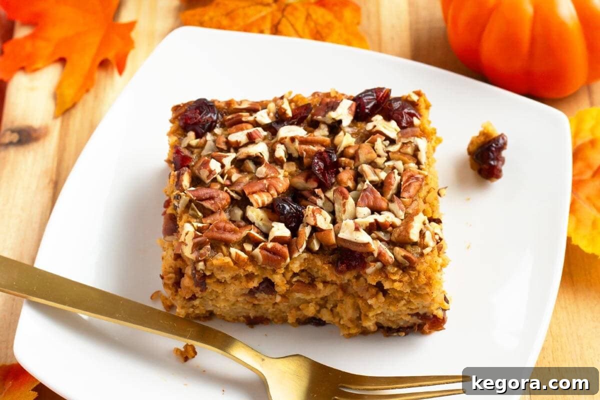 Cozy Morning Pumpkin Oatmeal Bake 3 Baked Pumpkin Oatmeal with a golden brown crust and toasted pecans