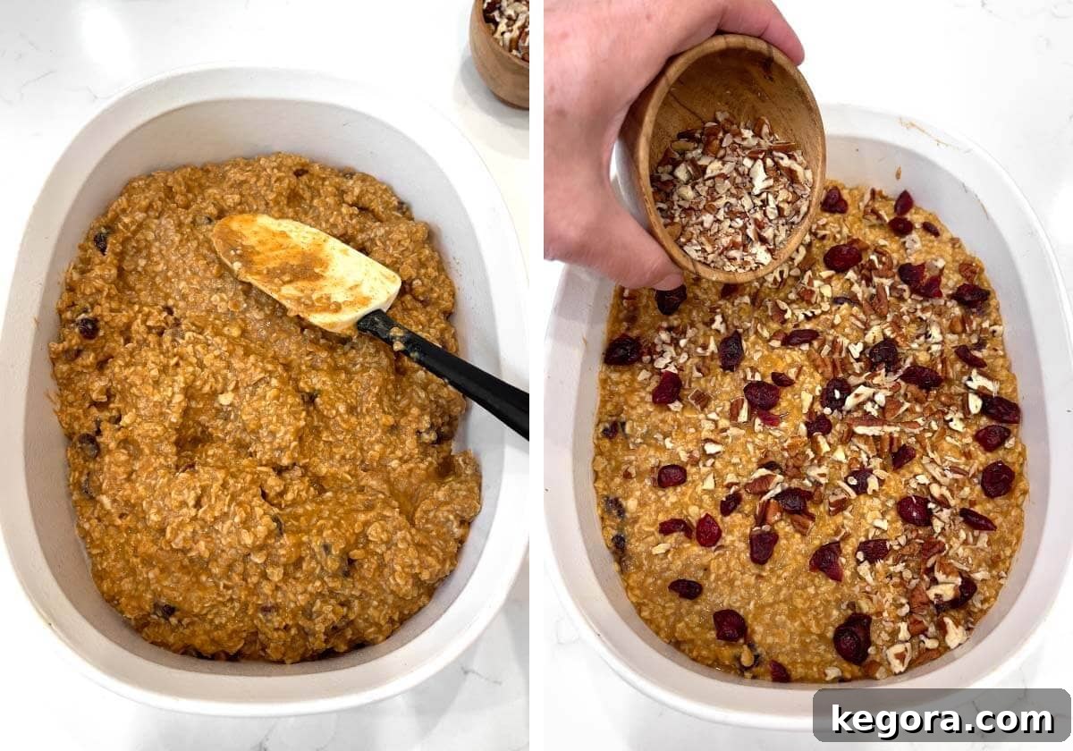 Cozy Morning Pumpkin Oatmeal Bake 9 Oat mixture in a baking dish, topped with chopped pecans and dried cranberries, ready for baking