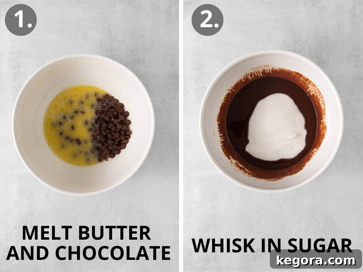 Melted butter and chocolate in a bowl, with granulated sugar being whisked in, forming the rich base of the oat flour brownie batter