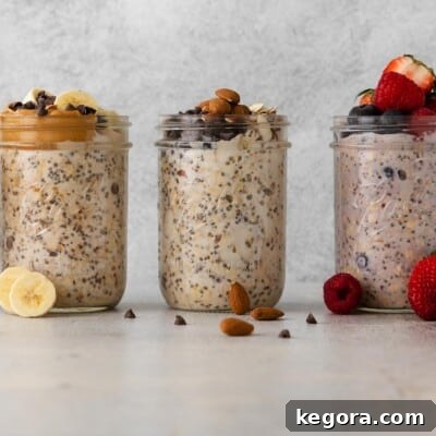 Three jars with three different varieties of overnight oats, each with unique toppings.
