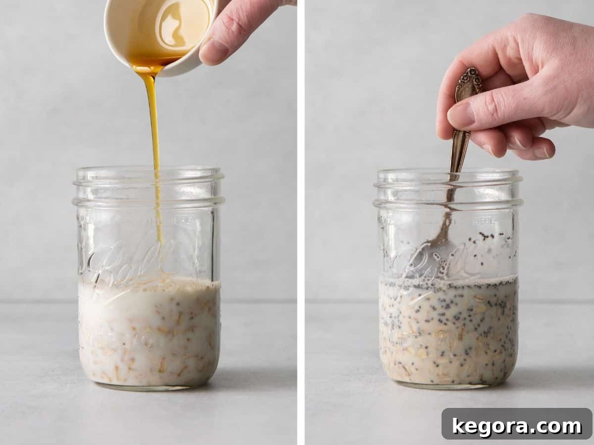 Overnight oats being prepared in a jar, with a hand pouring honey into the oats, and another hand stirring the mixture with a spoon.