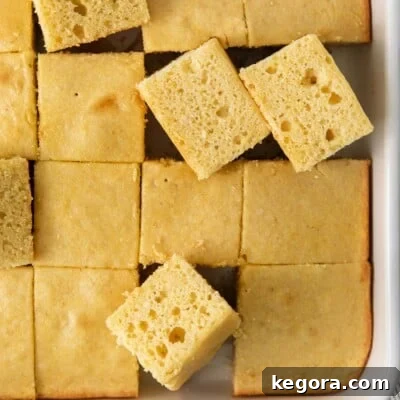 gluten-free cornbread in a baking dish, cut into squares