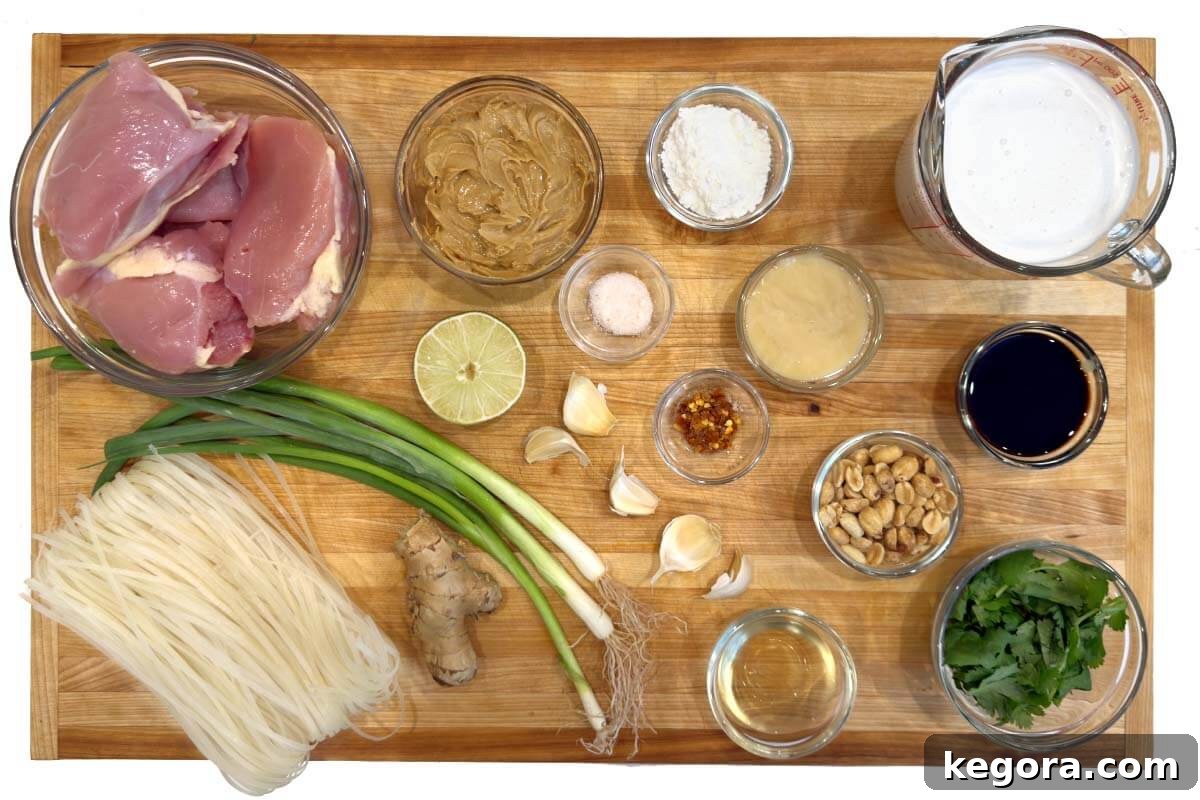 Crockpot Thai Peanut Chicken ingredients laid out on a board