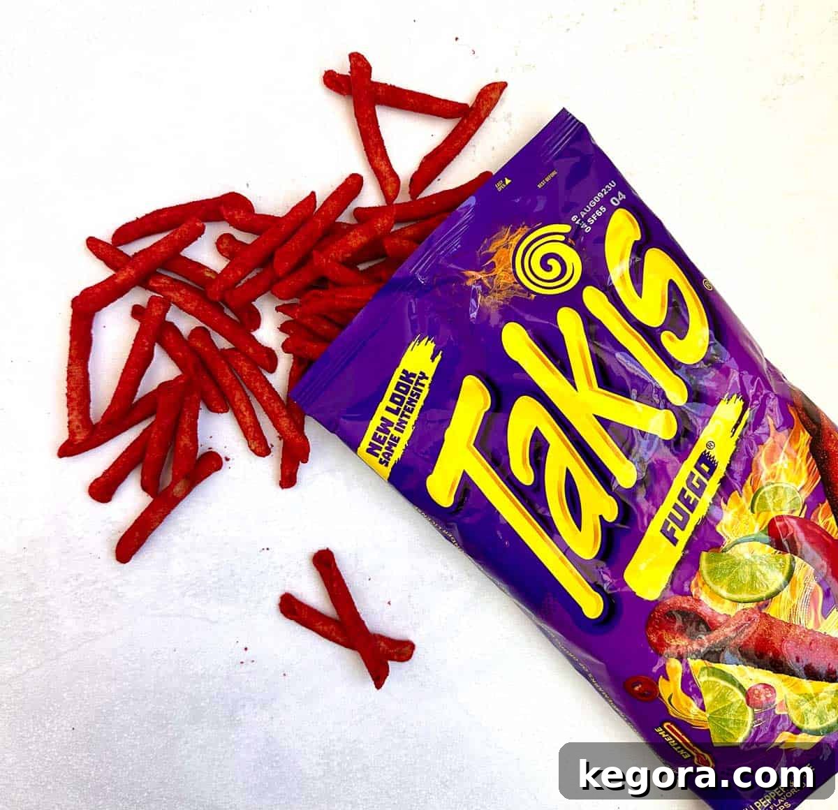 open bag of takis on white background