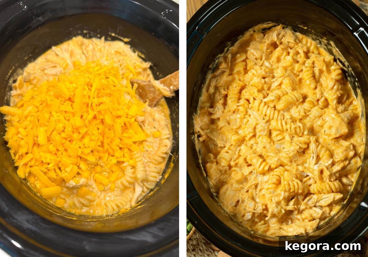 Remaining shredded cheese added to the finished creamy buffalo chicken mac and cheese, ready to be served