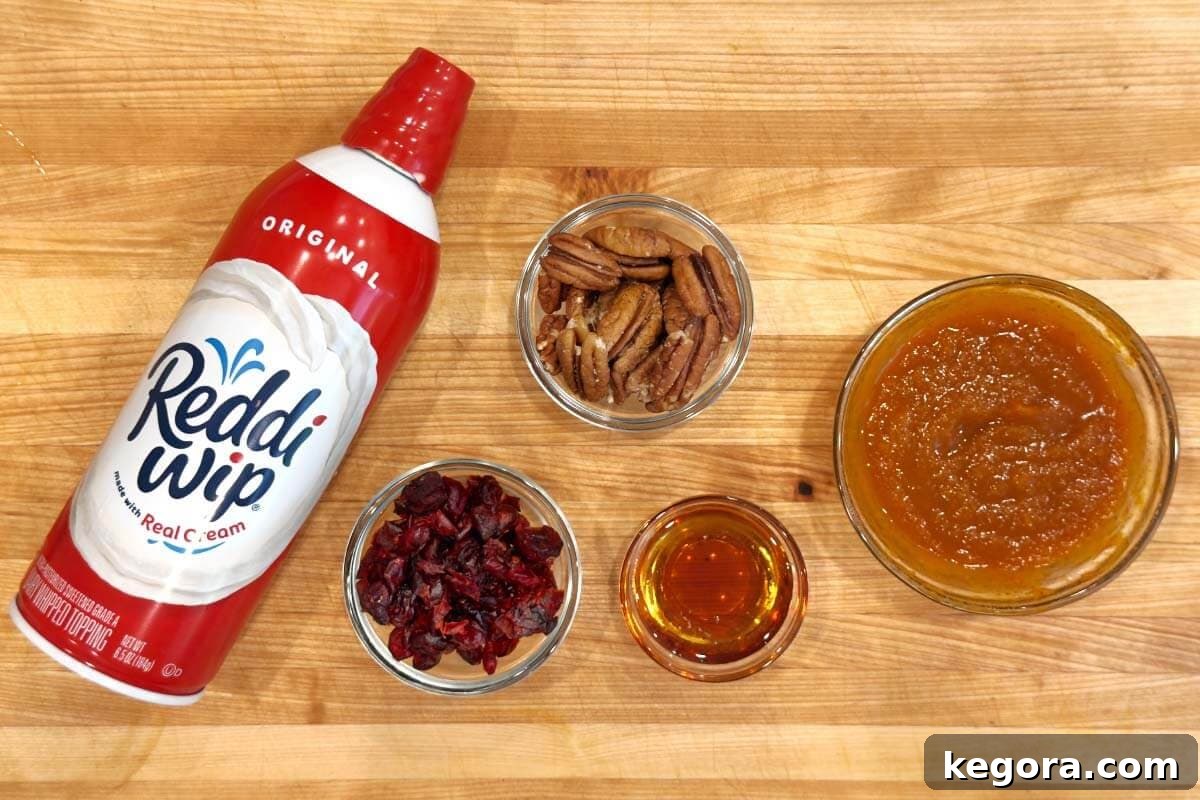 Pumpkin Spice Overnight Delight 5 Various garnishes like nuts, dried cranberries, and whipped cream for Pumpkin Overnight Oats
