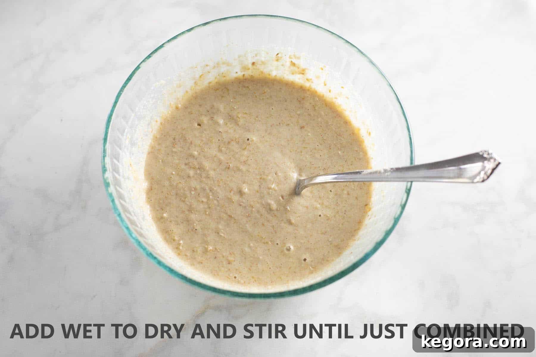 Gluten-Free Pancake Batter Smooth gluten-free pancake batter mixed in a clear glass bowl