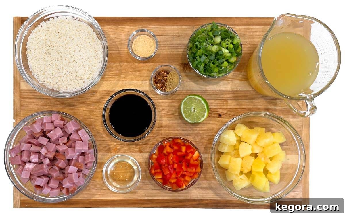 Ham and Pineapple Rice Casserole ingredients shot on a board
