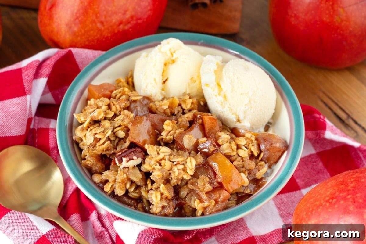 Crockpot Apple Crisp in slow cooker, ready to serve