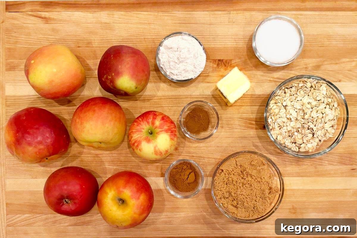 Crockpot Apple Crisp ingredients laid out on a wooden board