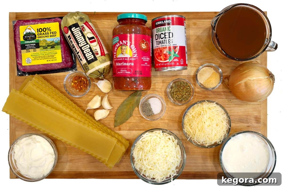 Effortless Slow Cooker Lasagna Soup 4 Individual ingredients for Crockpot Lasagna Soup laid out on a wooden board, including ground meat, onions, garlic, tomatoes, and cheese.