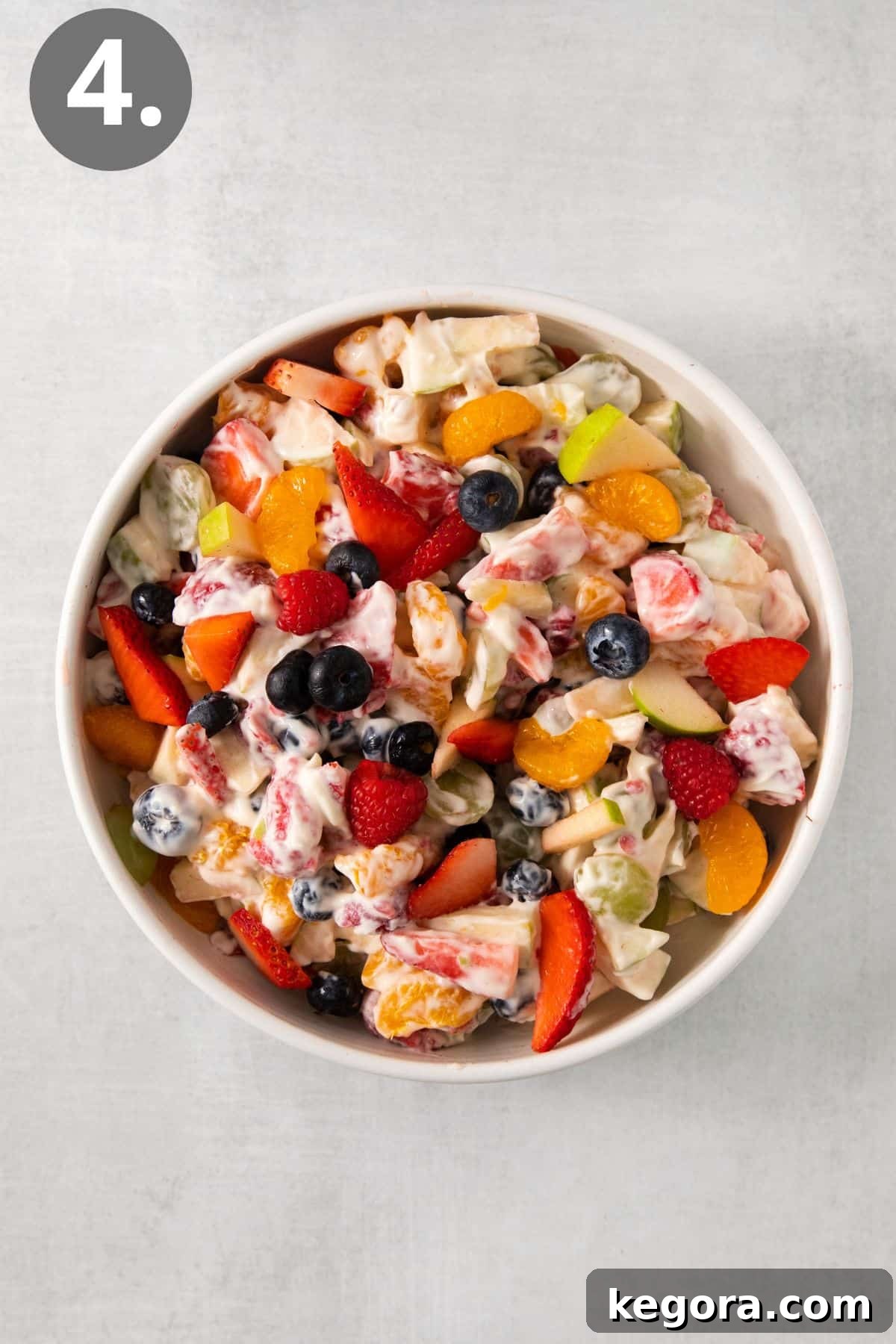 Vibrant Easter Fruit Bowl 8 Easter fruit salad in a bowl with honey mascarpone mixed in