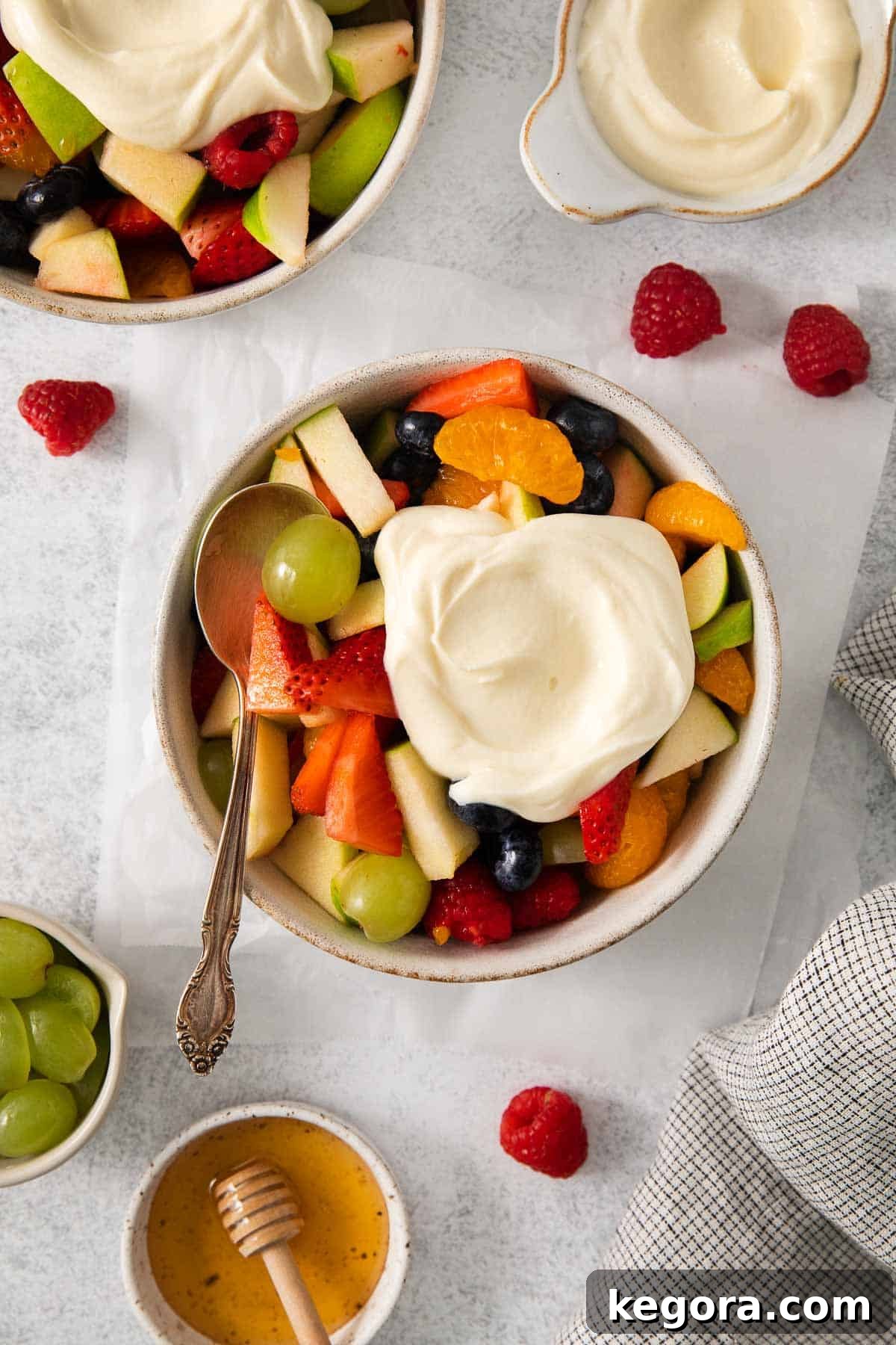 Vibrant Easter Fruit Bowl 9 Easter fruit salad in a bowl with honey mascarpone on top