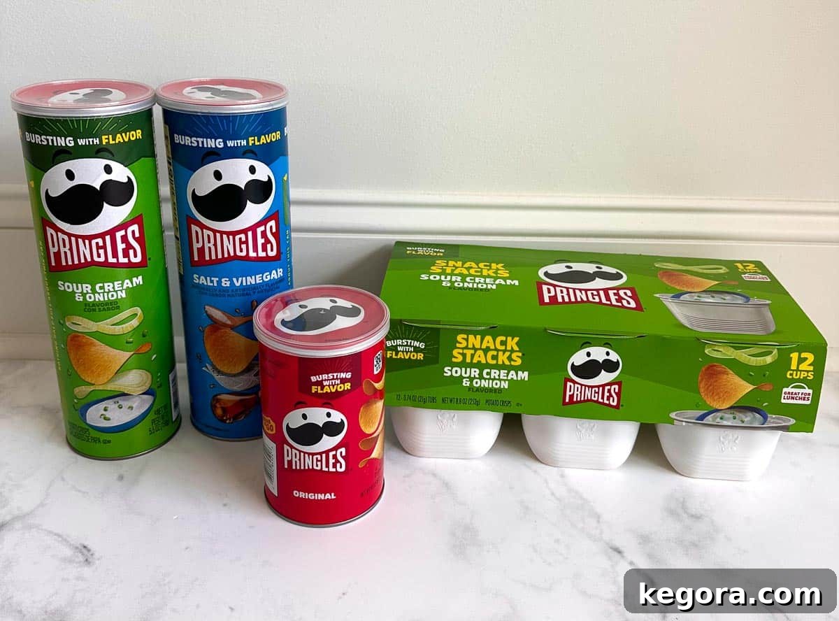Pringles Gluten-Free Fact Check 3 Several different flavors of Pringles displayed on a white background, emphasizing variety.