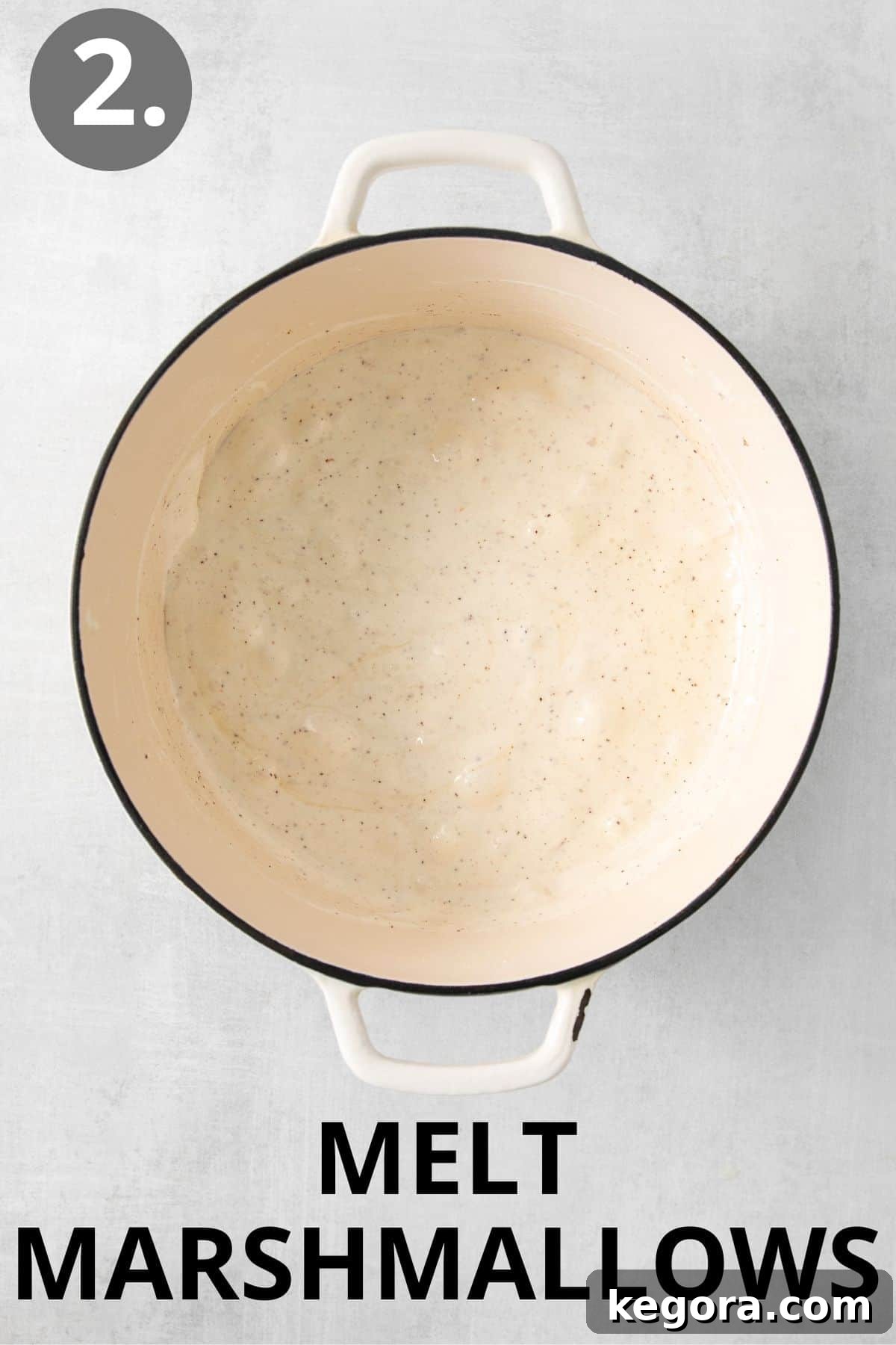 Gluten-Free Oreo Crunch Bars 5 Melted marshmallows swirling in a pot with browned butter, creating a smooth, gooey mixture