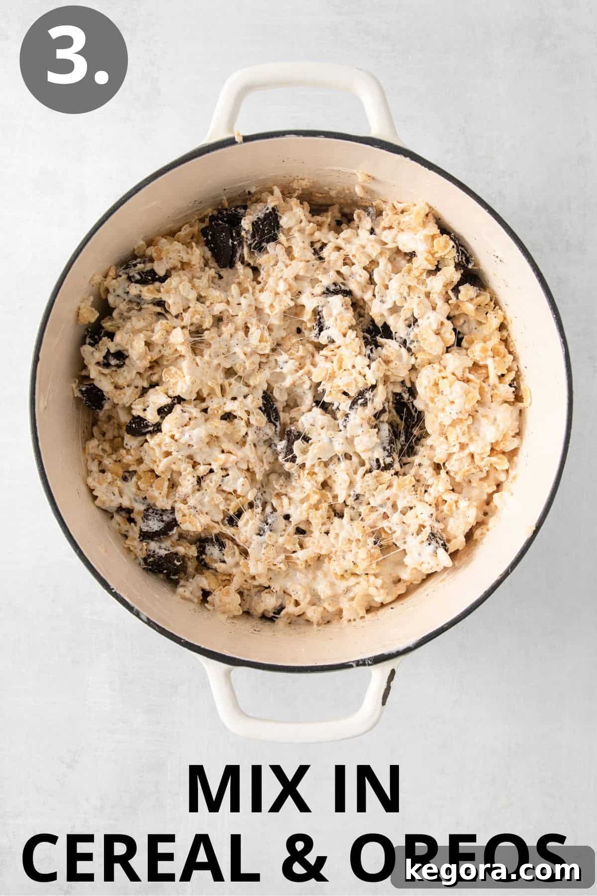 Gluten-Free Oreo Crunch Bars 6 Crispy rice cereal and chopped Oreo cookies being mixed into the melted butter and marshmallow mixture in a large pot