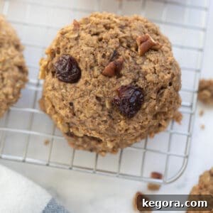 Close-up of an oatmeal cookie with bananas, raisins, and nuts