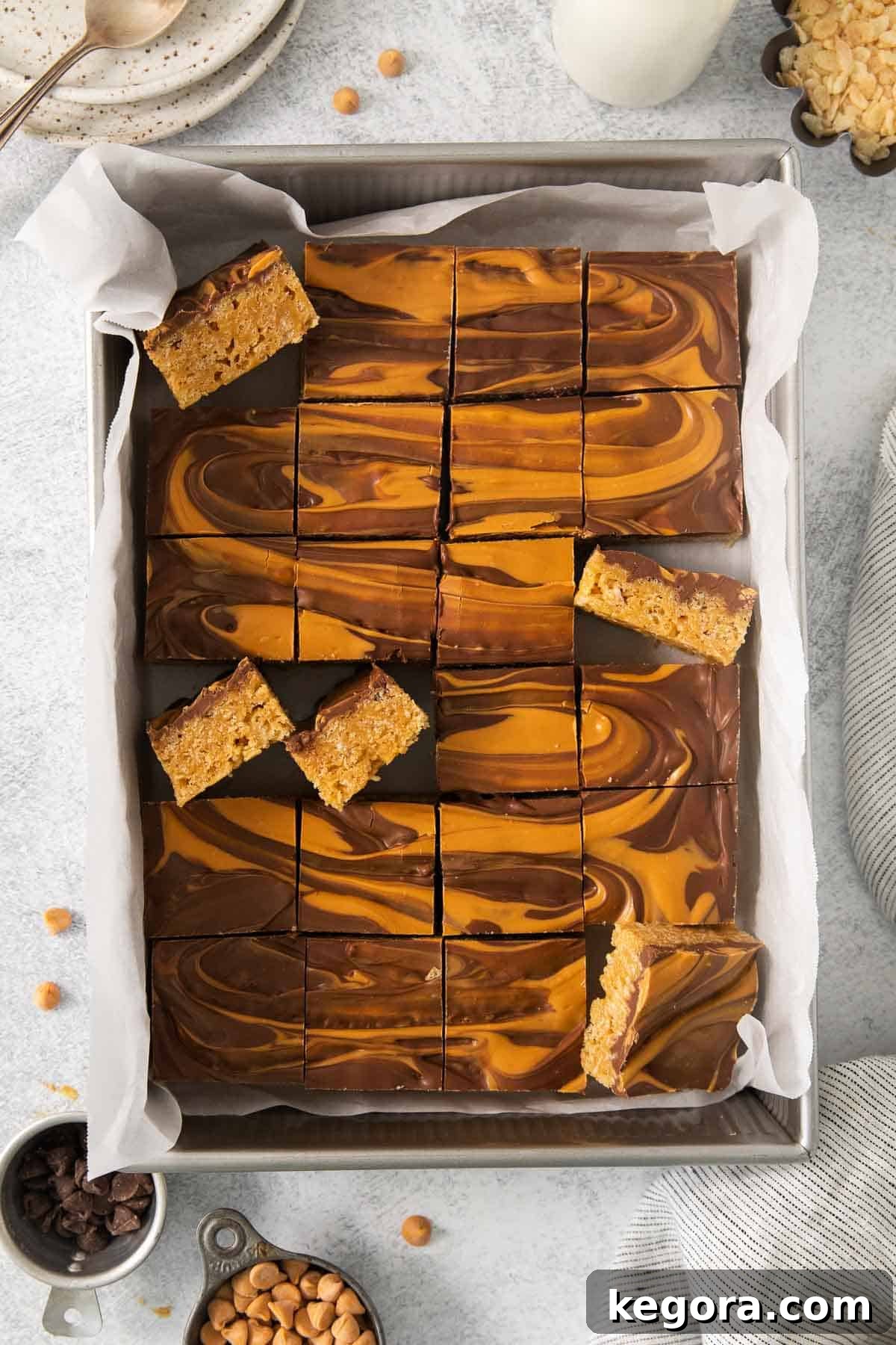 Scotcheroos in a baking dish, sliced 