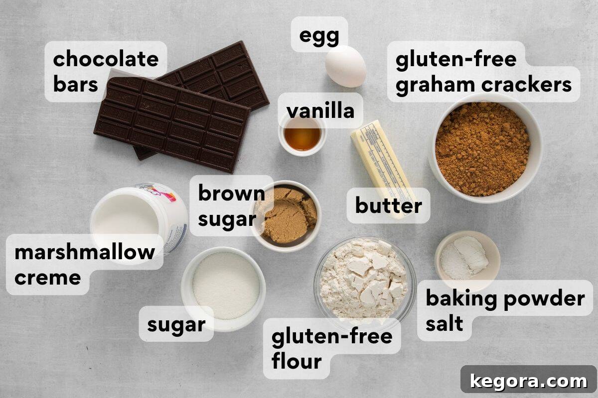 Precisely measured and labeled s'mores bar ingredients, including gluten-free flour, graham crackers, marshmallow creme, and chocolate.