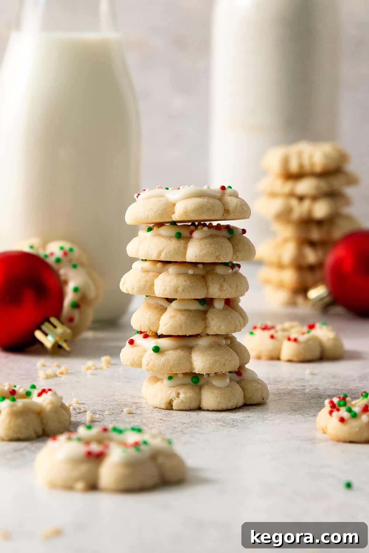 A charming stack of gluten-free spritz cookies on a kitchen countertop, ready to be enjoyed.